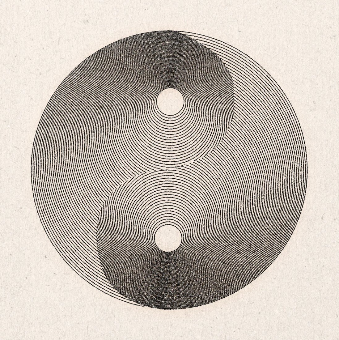 A yin-yang drawn in concentric engraved lines.